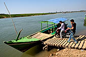 The small harbour where you can cross the Myittha river with motor boat to Inwa, Myanmar.